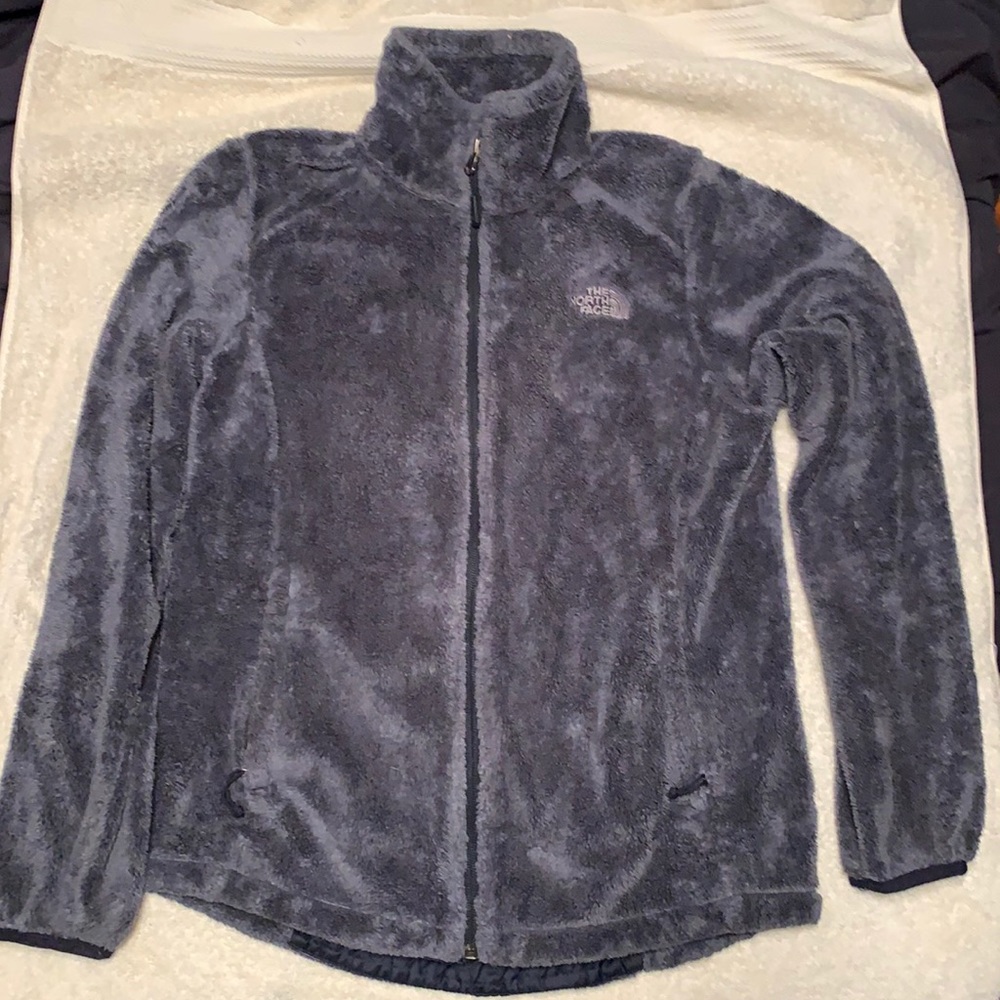 The north face blue fleece zip up jacket size small. Used good condition